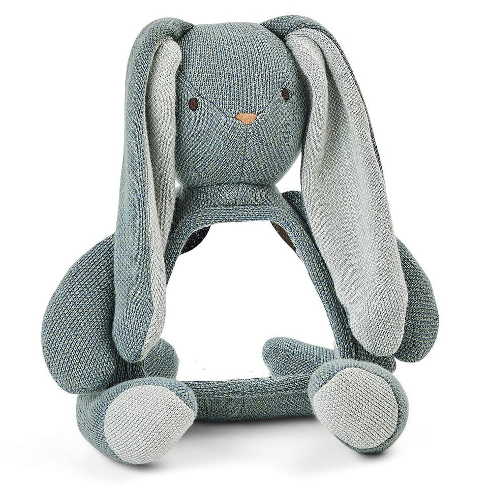A plush stuffed bunny toy in a muted blue-gray fabric, featuring long floppy ears, small embroidered eyes, and a tiny orange stitched nose, photographed on a clean white background.