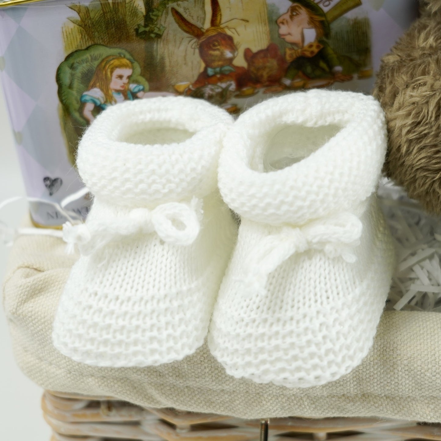white baby bootees