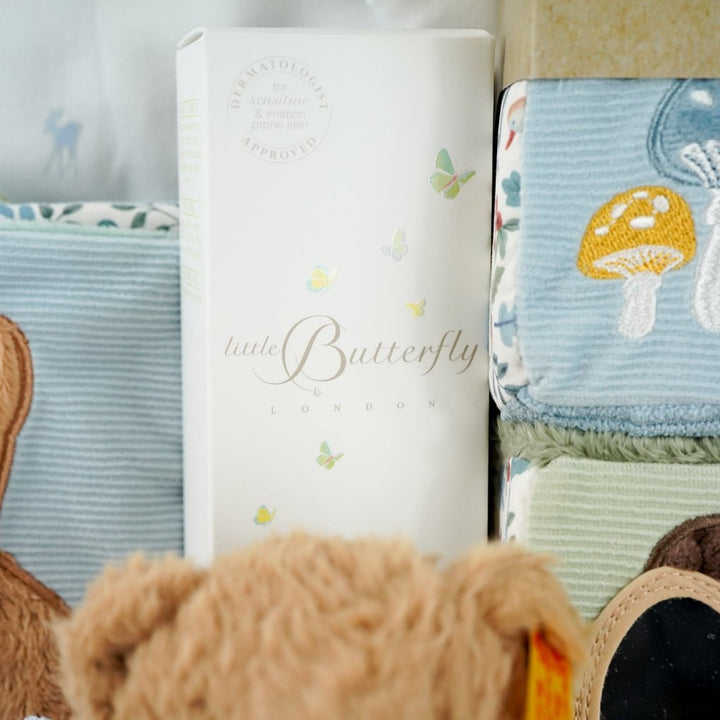 baby boy luxury baby hamper wioth luxury white clothing set, little dutch soft blocks with forest animals, little duct soft book with forest animals, organic baby bath, soft steiff teddy bear, baby white cute slippers 