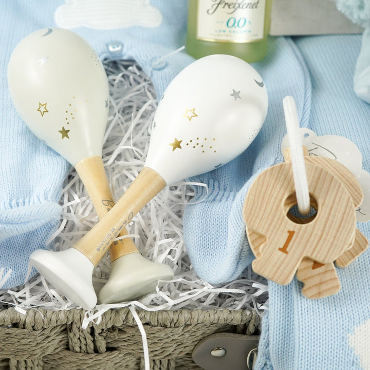 luxury baby and new parents hamper gift, blue baby blanket with white rabbit, knit blue romper with feet and white bunny, maracas, wooden teething key ring, small bottle of freixenet, chocolate, Little Dutch baby bunny milestone cards in a box, soft blue bunny in a velour pj's