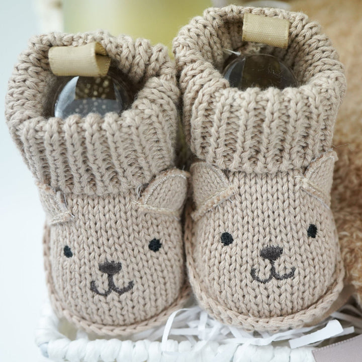 teddy themed baby gift hamper, neutral cream baby cardigan with embroidered teddy on the back, soft Nattou teddy with matching comforter, caramel coloured baby teddy booties, baby organic wash, no alcohol prosecco