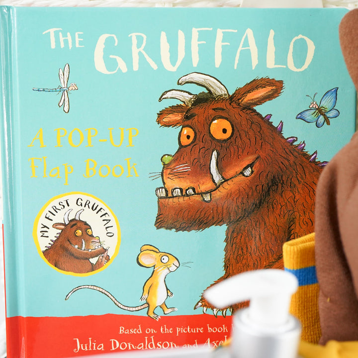 Pop-up flap book 'The Gruffalo' with a plush toy of the Gruffalo character.