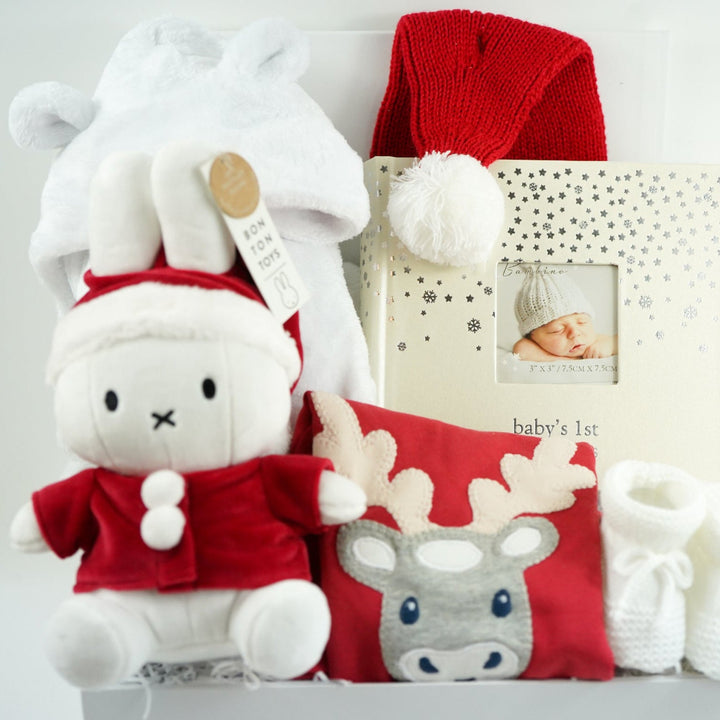 baby's first christmas hamper with a santa miffy, organic cotton reindeer outfit , baby santa hat and 1st Christmas photo album