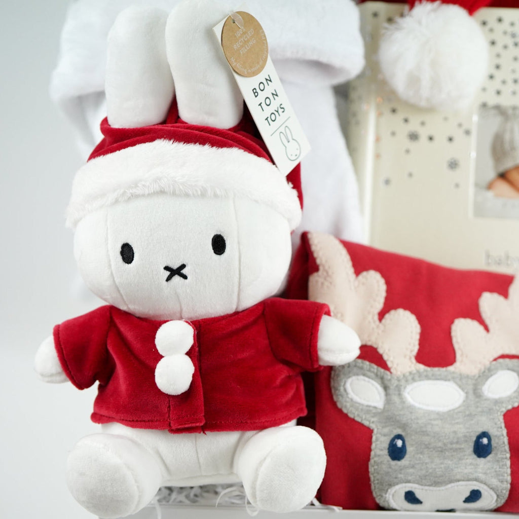 baby's first christmas hamper with a santa miffy, organic cotton reindeer outfit , baby santa hat and 1st Christmas photo album