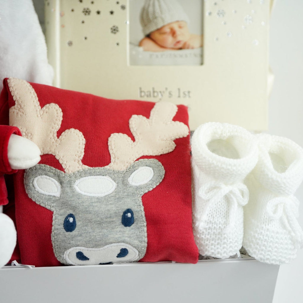 baby's first christmas hamper with a santa miffy, organic cotton reindeer outfit , baby santa hat and 1st Christmas photo album