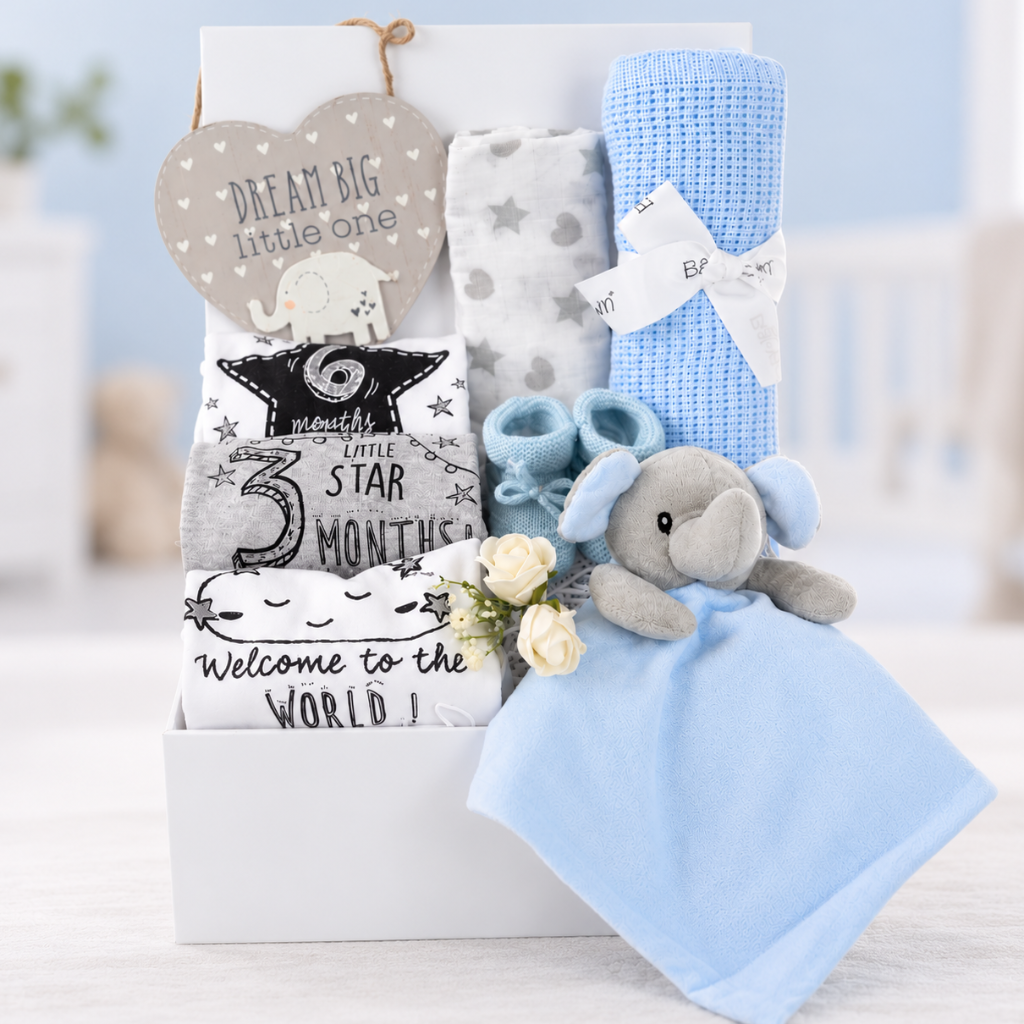 Baby boy hamper box with set of 3 milestone bodysuits, cellular blanket  elehant baby comforter in blue, blue knit booties and a muslin