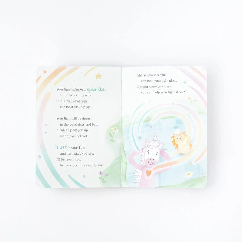 soft pink unicorn snuggler and 2 board books promoting emotional health