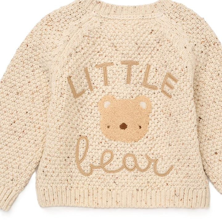 Beige knitted baby cardigan with 'Little Bear' text and bear graphic 
