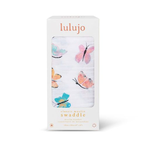 baby swaddle in white with colourful butterflies 