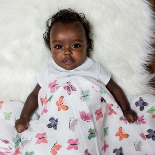 baby swaddle in white with colourful butterflies 