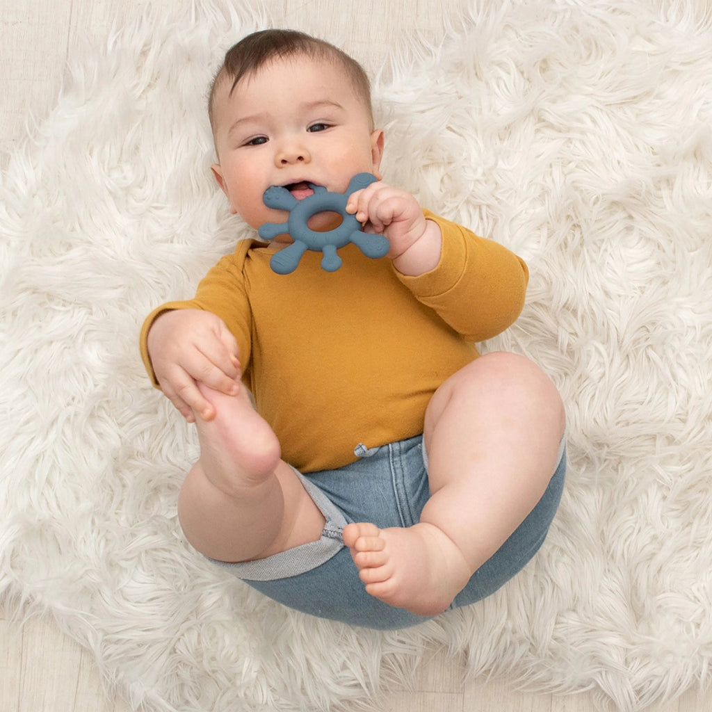 green splash shaped baby teether 