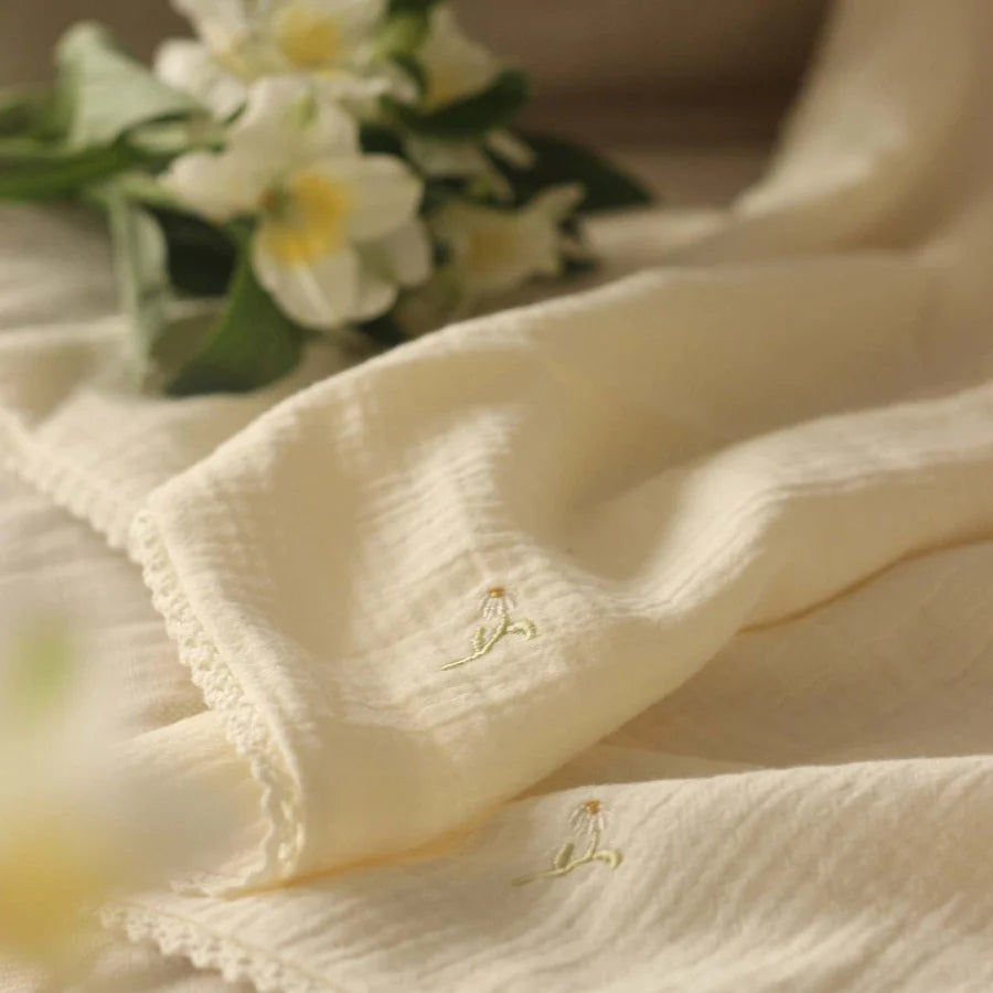 Organic Muslin baby blanket with delicate camomile embroidery