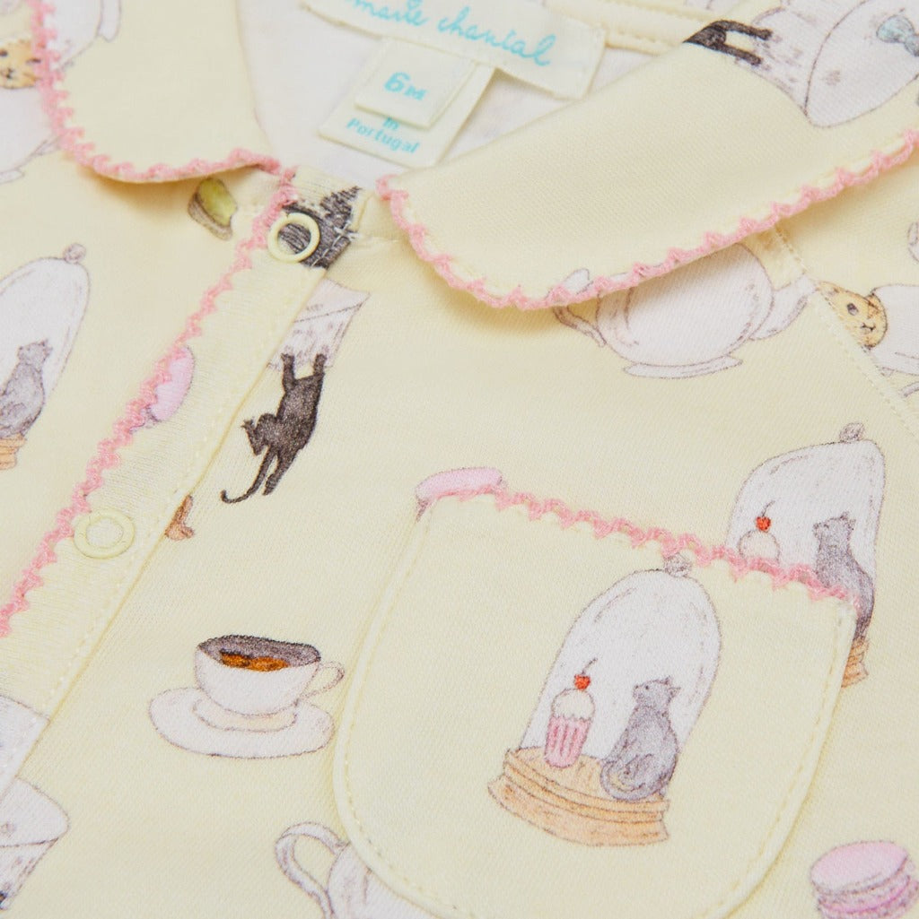 Vanilla coloured sleepsuit with pink picot edge and kittens 