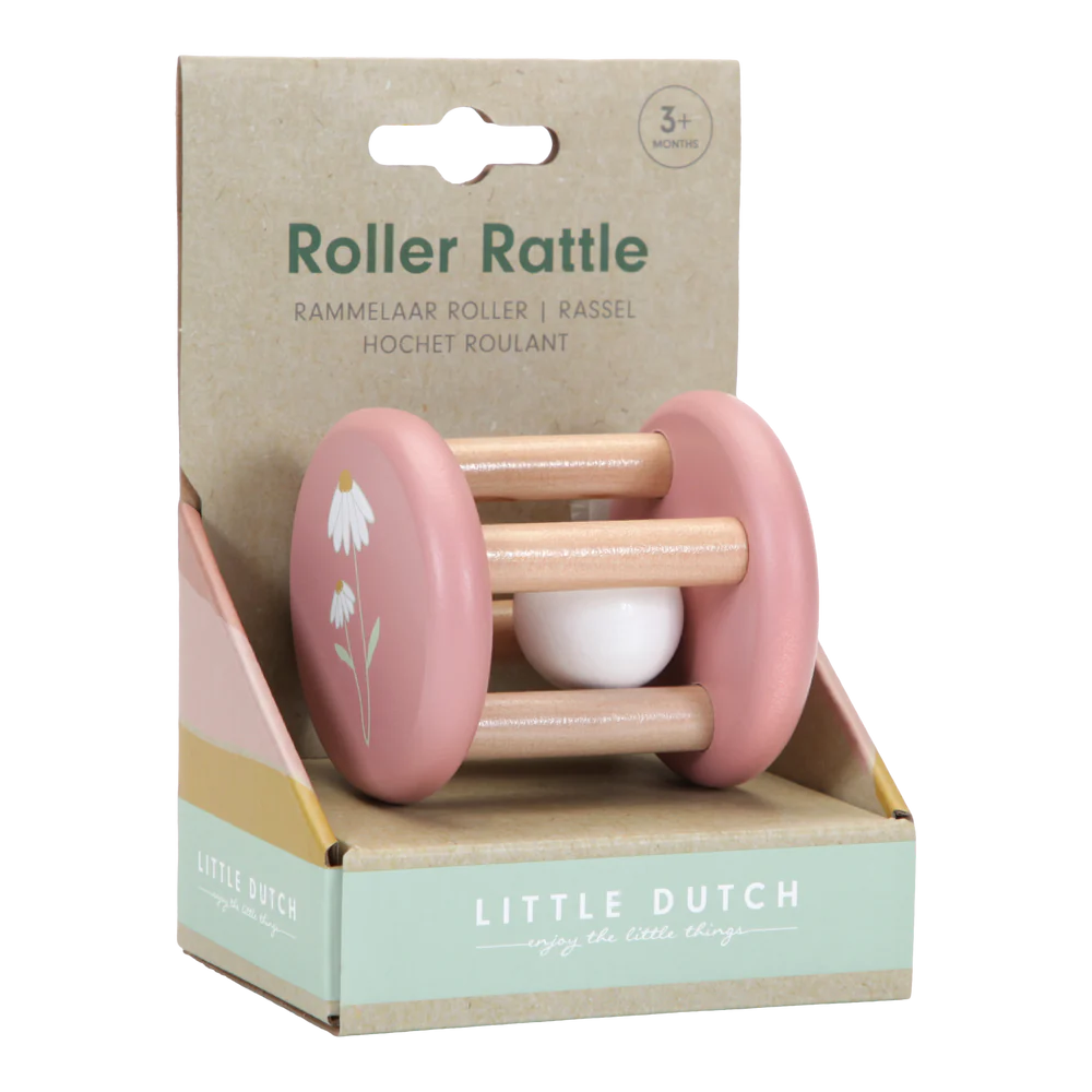 Pink roller rattle with a white daisy on the end