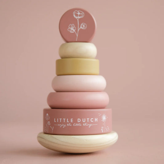 rocking wooden stacker with pastel pinks and lemon rings