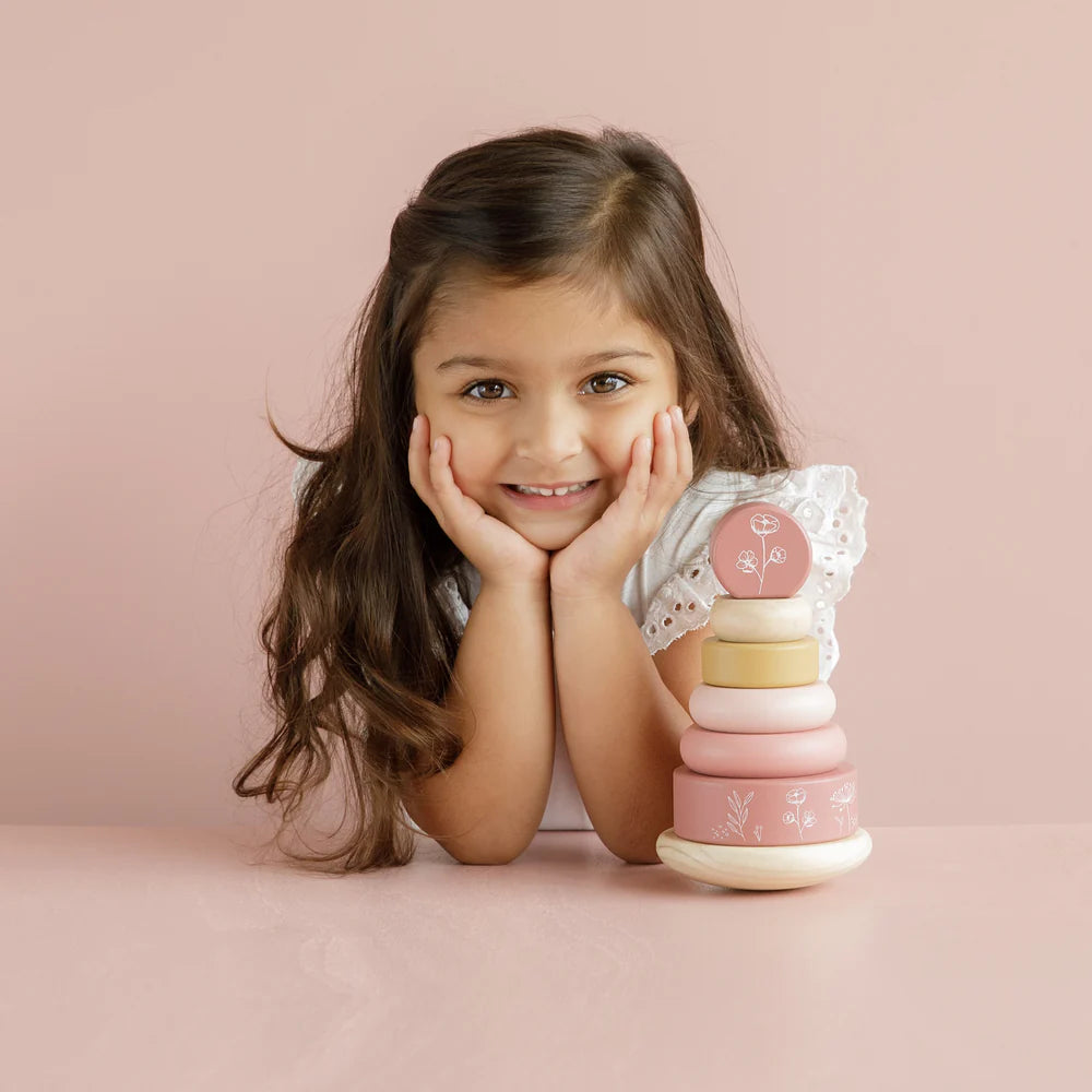 rocking wooden stacker with pastel pinks and lemon rings