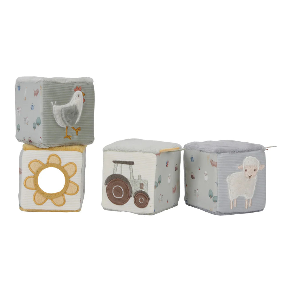 soft stacking bricks with sensory fabrics, mirror and taggie