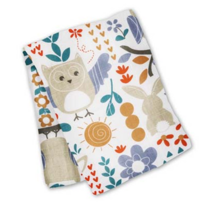 white swaddle with an owl and bunny