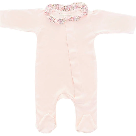 pink magnet fastening baby pink sleepsuit with liberty ruffle fabric