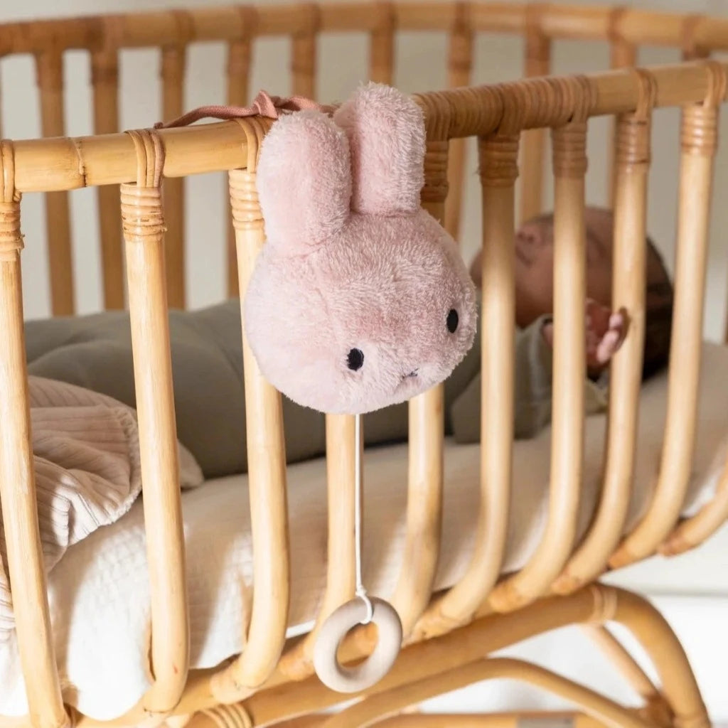 Pink fluffy miffy head musical handing cot toy