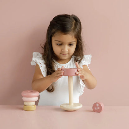 rocking wooden stacker with pastel pinks and lemon rings