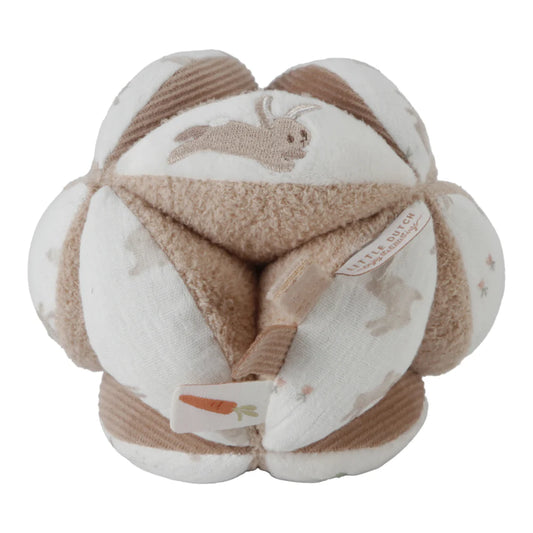 neutral baby sensory ball in soft caramel and white with embroidered bunnies
