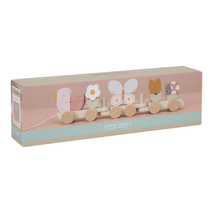 wooden train woith flowers and butterflies stacking blocks and pull a long string in pastel pinks, green and blue
