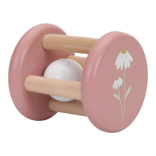 Pink roller rattle with a white daisy on the end