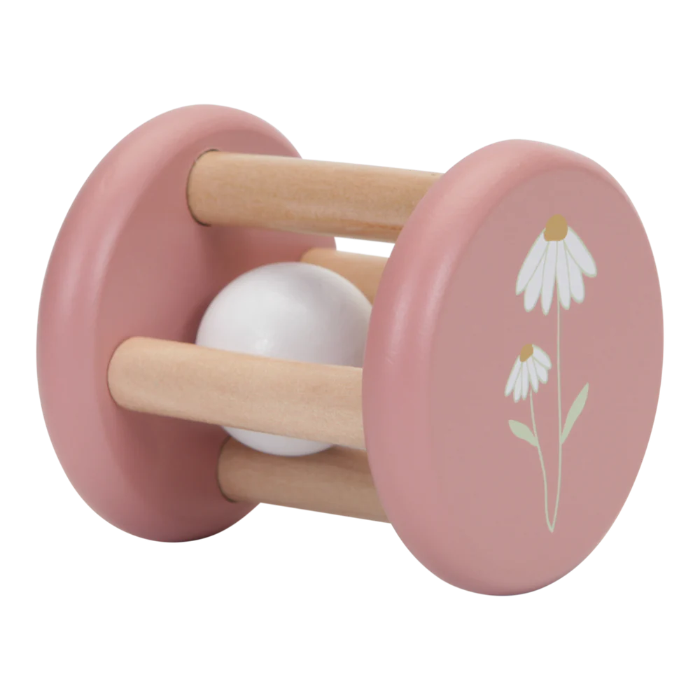 Pink roller rattle with a white daisy on the end