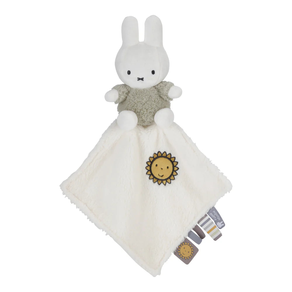 white Miffy cuddle cloth with white Miffy in green fluffy outfit and taggies