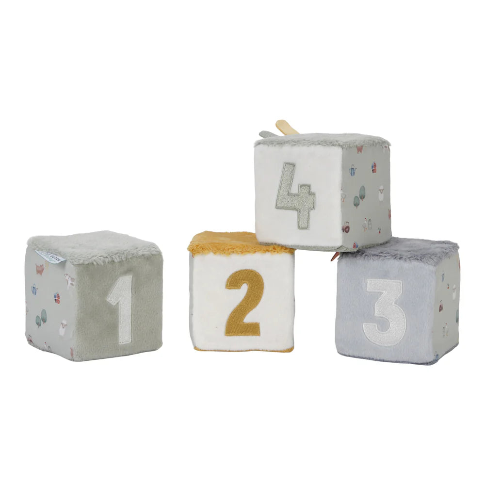 soft stacking bricks with sensory fabrics, mirror and taggie