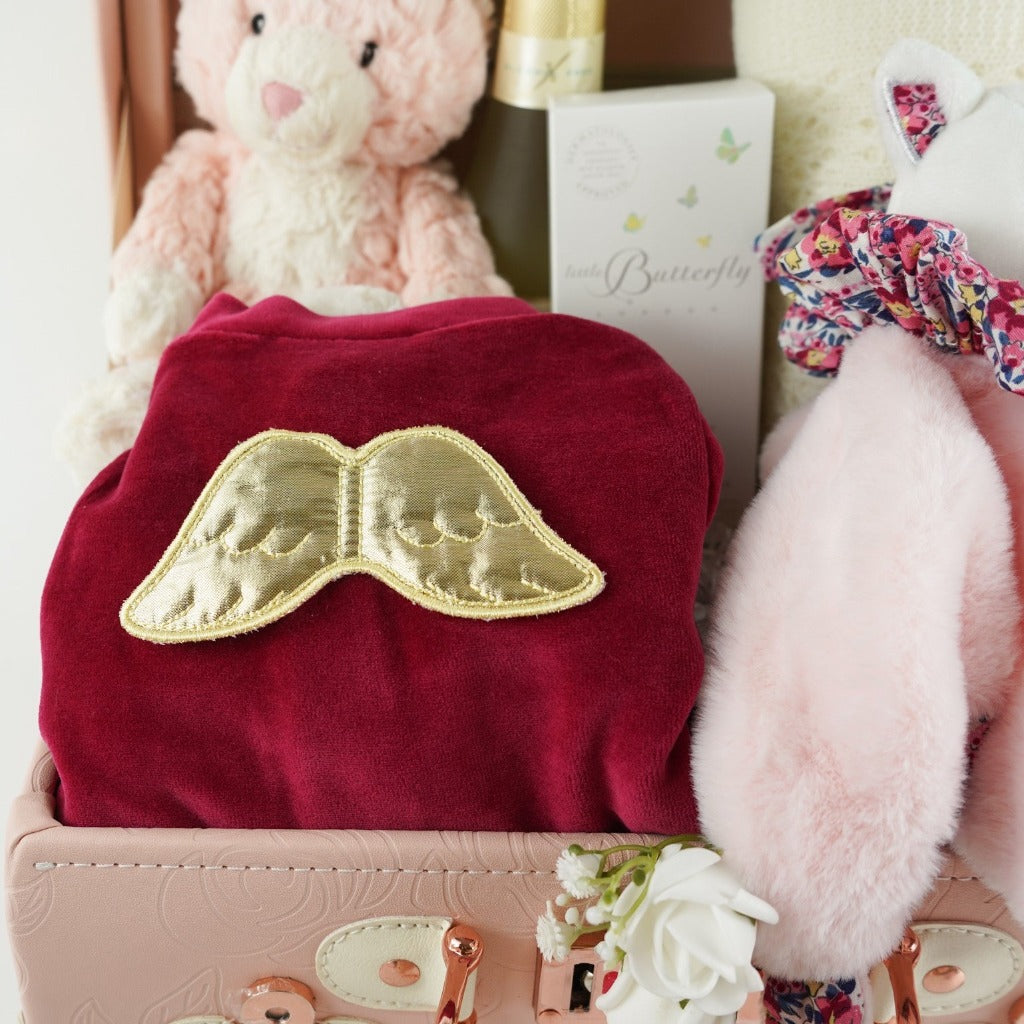 Luxury baby suitcase in pink, velour angel wing suitcase, luxury cashmere blanket, little butterfly London mother and baby toiletries