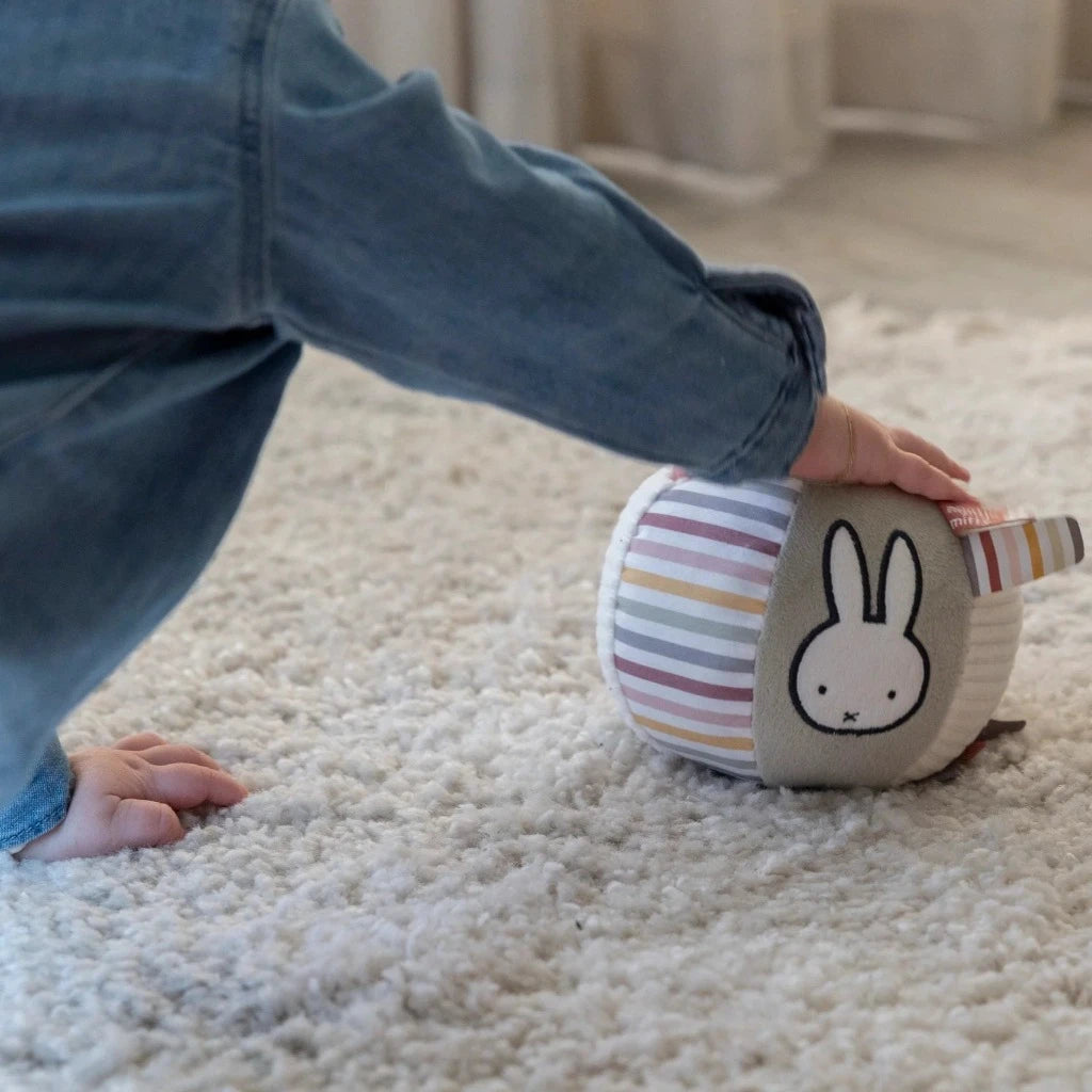 Soft fluffy baby ball with taggies and Miffy face,