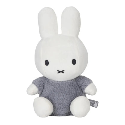 White miffy soft toy with a grey/blue fluffy outfit