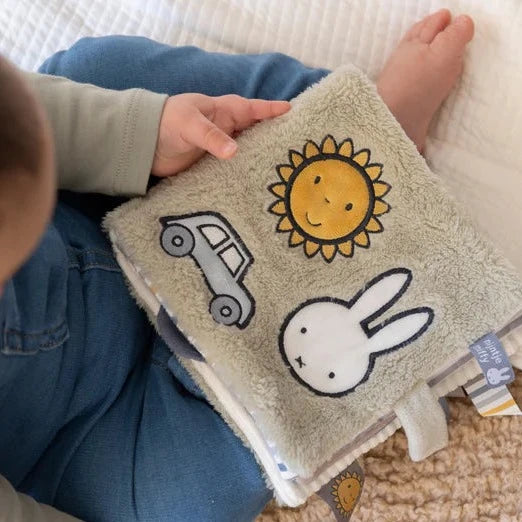 soft fluffy green miffy sensory soft book with taggies and a mirror