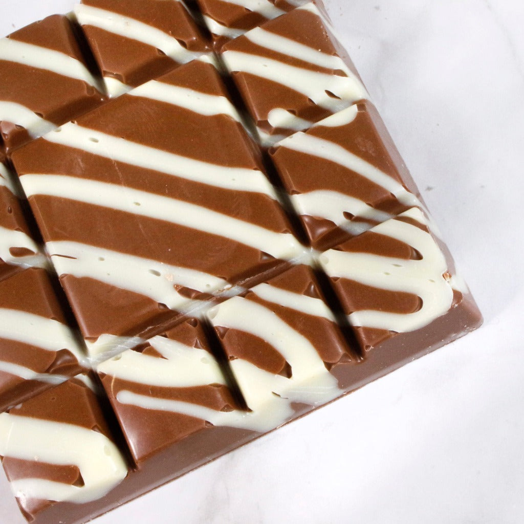 chocolate bar with white drizzle 
