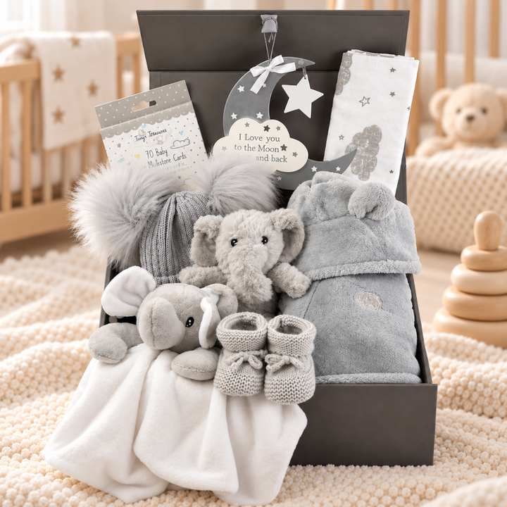 grey neutral baby hamper bo with grey dressing gown, elephant soft toy, elephant comforter , nursery plaque, mile stone cards , hat