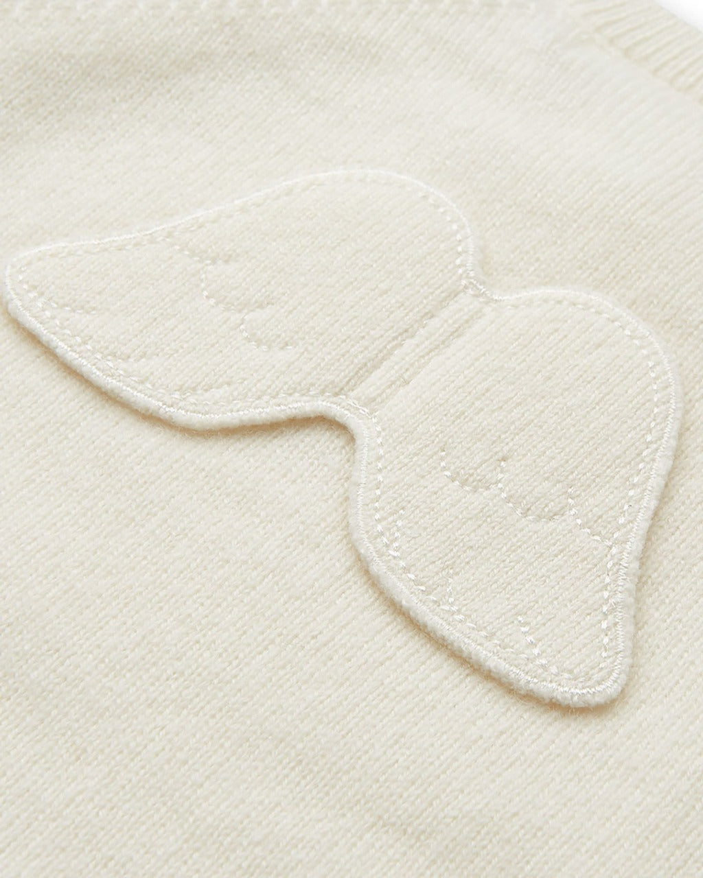 cream cashmere baby romper with angel wings by Marie Chantal
