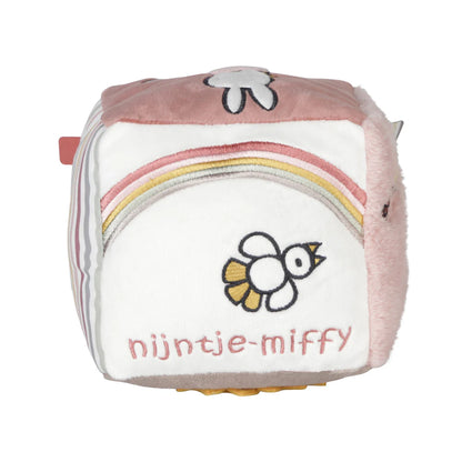 Soft Fluffy Activity Cube Miffy themed in pink with a differebt design on each side, includes a mirror, taggies and pictures of miffy flying a kite and riding a bicycle