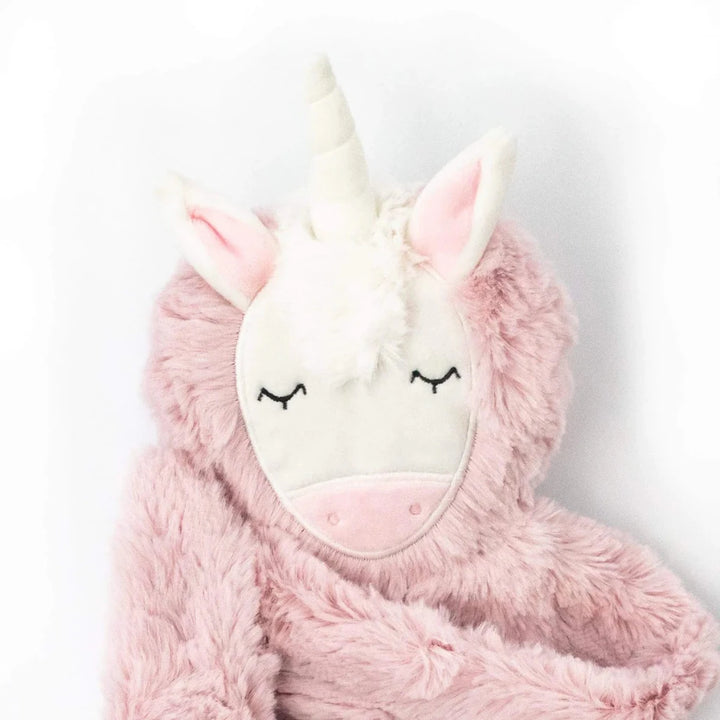 soft pink unicorn snuggler and 2 board books promoting emotional health