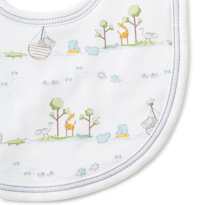 White baby bib in prima cotton with blue accent . Noah's ark and animal design
