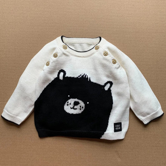 Cream and black organic baby jumper with bear face on the front and back
