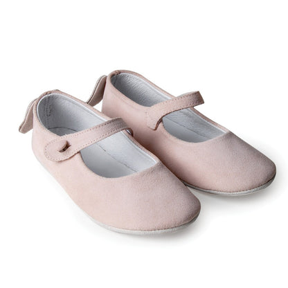 Pink suede baby slippers with angel wings on the back