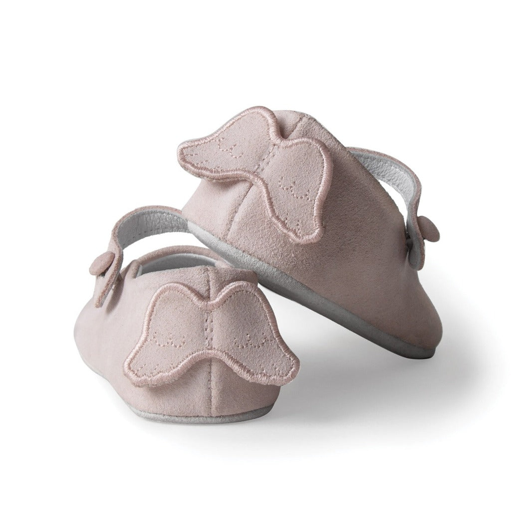 Pink suede baby slippers with angel wings on the back