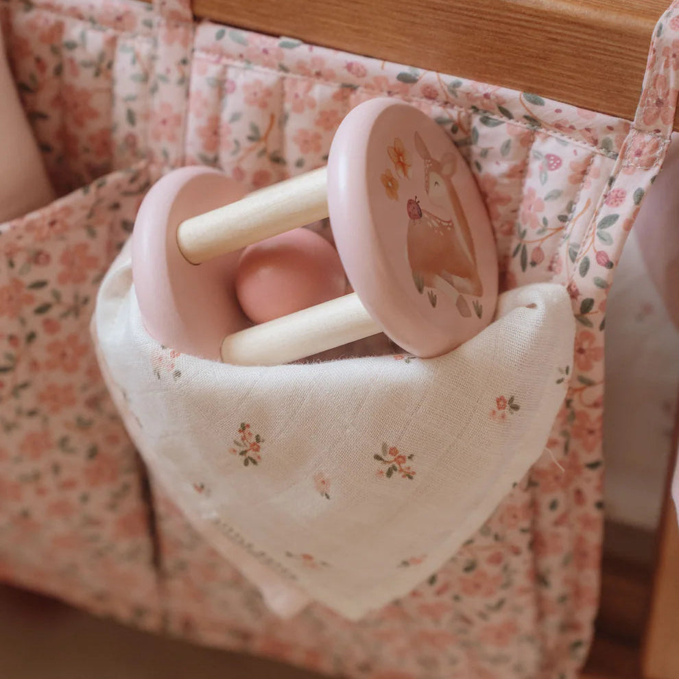 wooden baby roller rattle in pink with fawn design 