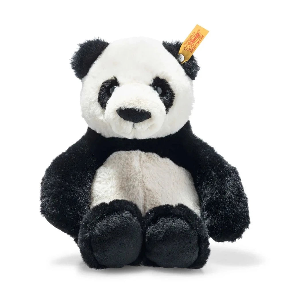 Black and white soft panda toy with button in ear