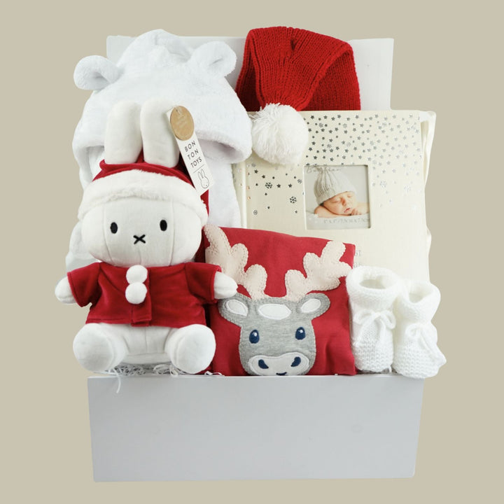 baby's first christmas hamper with a santa miffy, organic cotton reindeer outfit , baby santa hat and 1st Christmas photo album