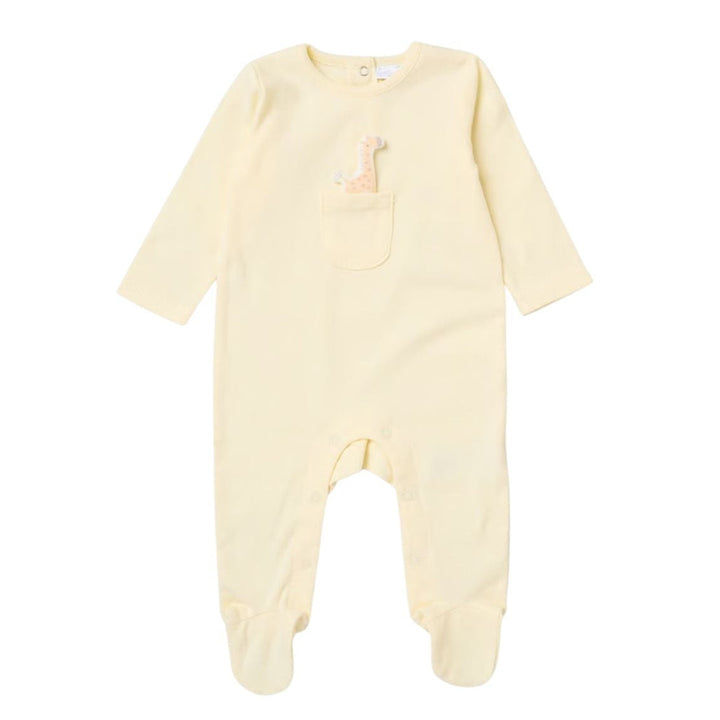 A pale yellow long-sleeve baby footed romper with a small embroidered giraffe on the chest, displayed against a solid white background.