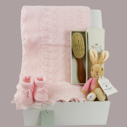Baby Girl hamper, pink baby girl shawl  by G H   Hurt, Natural baby hairbrush in presentation box by Marie Chantal, Pink knit booties , Flopsy bunny soift rattle toy