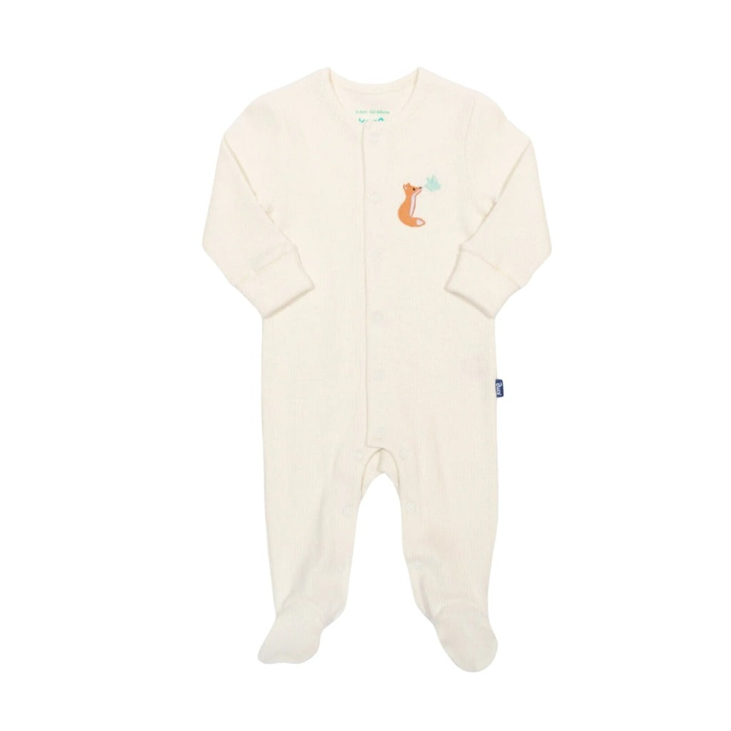 Baby hamper with organic clothing set includes baby sleepsuit in white with fox and dove design, baby bodysuit with long sleeves and fox and dove design, baby leggings with fox and matching hat, Organic cotton bee soft toy and matching comforter, organic cotton white swaddles with yellow design, green baby journal, organic baby toiletries